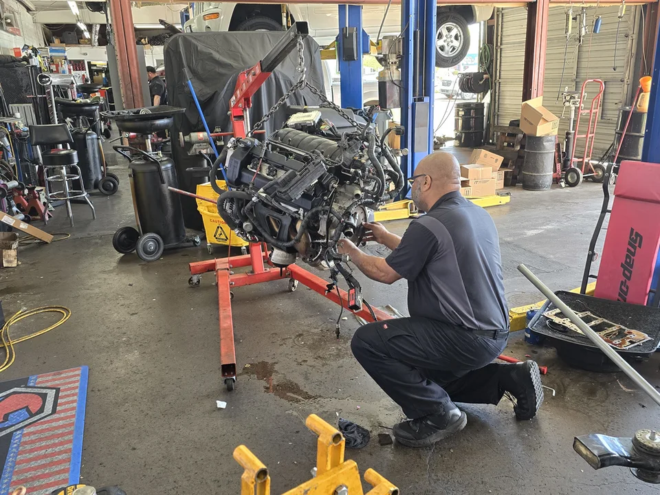 ase technician performing car engine replacement in arizona