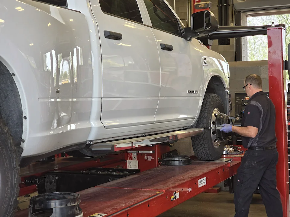 wheel maintenance on white dually heavy duty truck in arizona